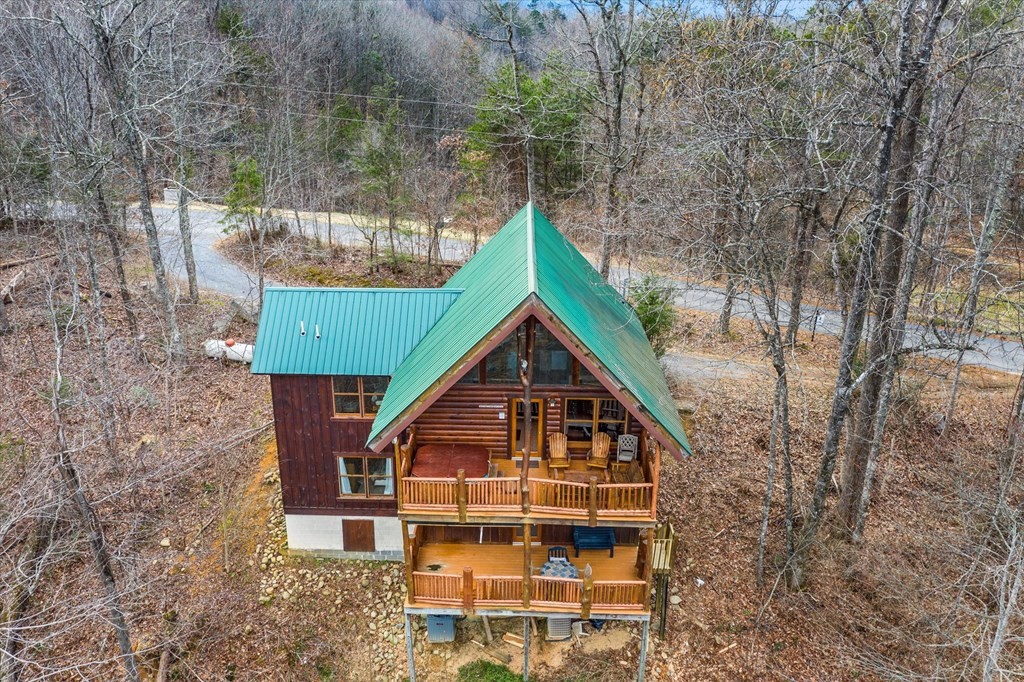 4130 Evans Chapel Road Sevierville, TN 37876 - Photo 32 of 33 a view of a house with a yard
