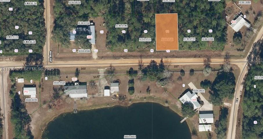 0 Canine Street Interlachen, FL 32148 - Photo 2 of 2 a view of a building from a yard