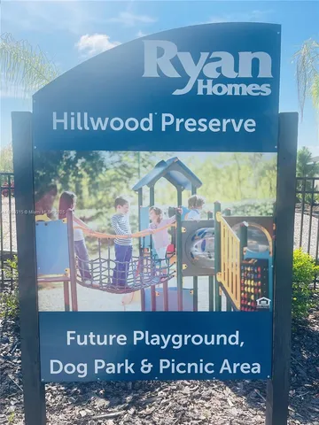 a view of a fountain in front of house