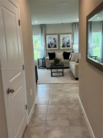 a kitchen with a stove microwave and refrigerator