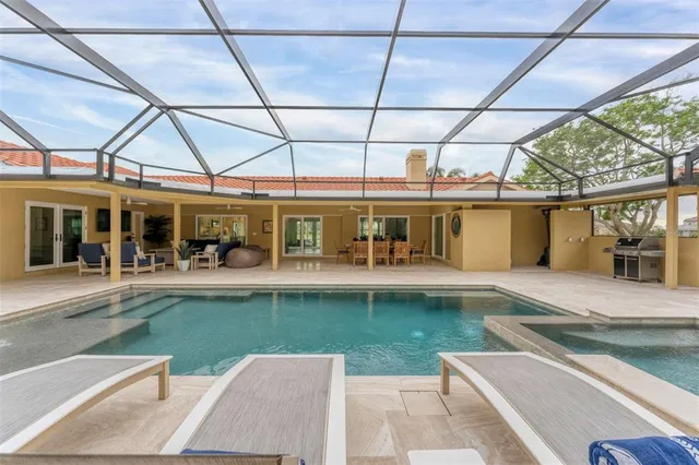 a sign that is sitting in front of flowers