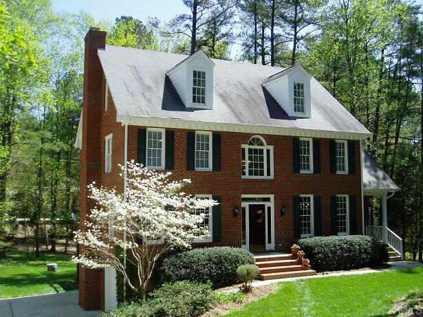 1101 Carlow Court Raleigh, NC 27615 - Photo 1 of 1 front view of a house with a yard
