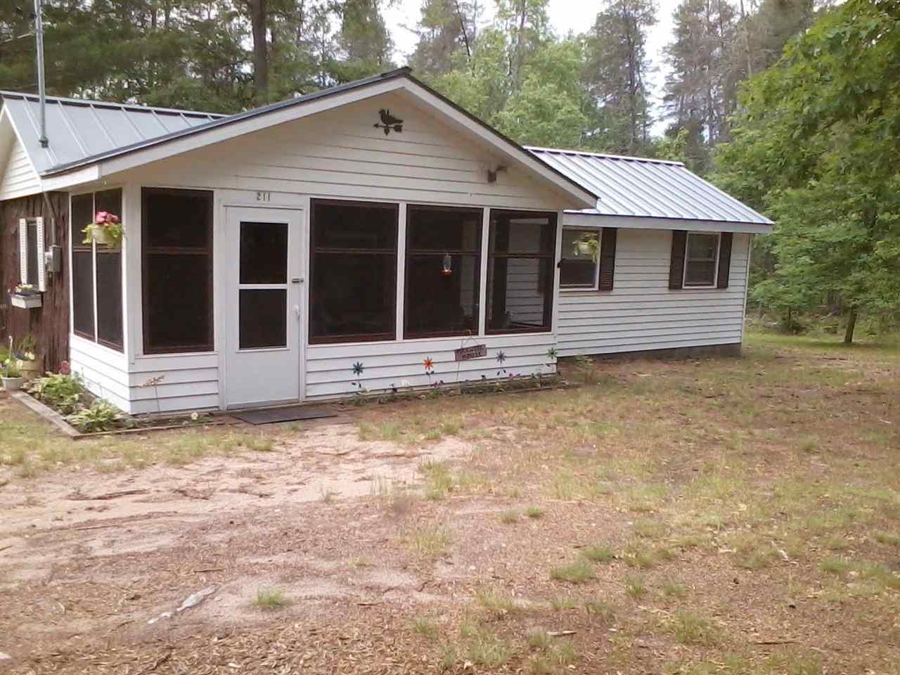 211 West Edmond Woods Road Harrison, MI 48625 - Photo 1 of 25