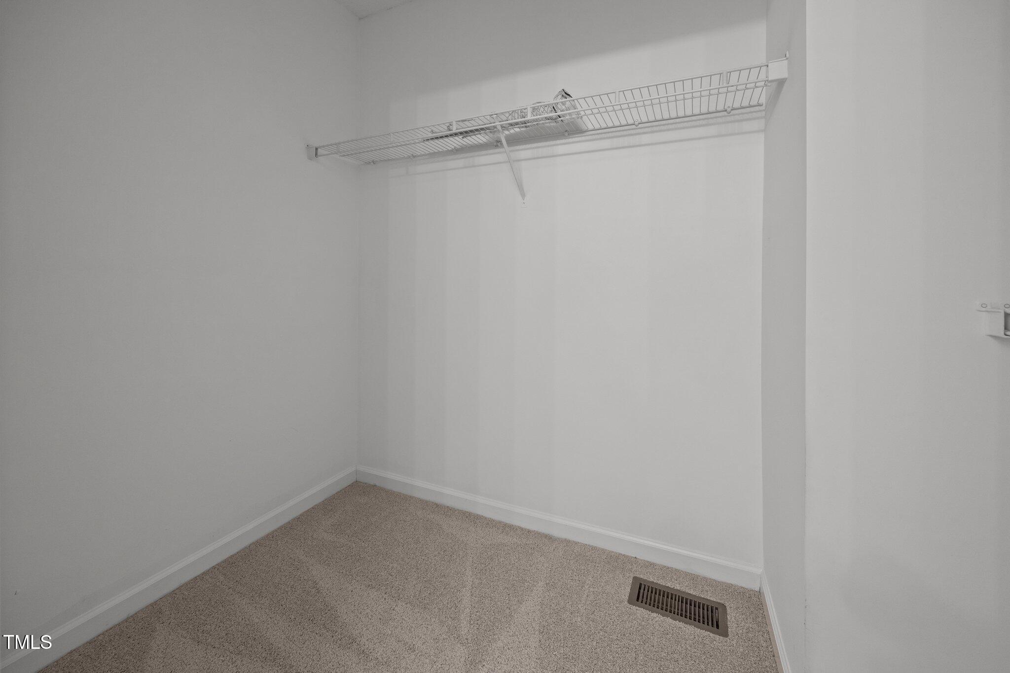 408 Flagg Road Holly Springs, NC 27540 - Photo 20 of 32 a view of an empty walk in closet