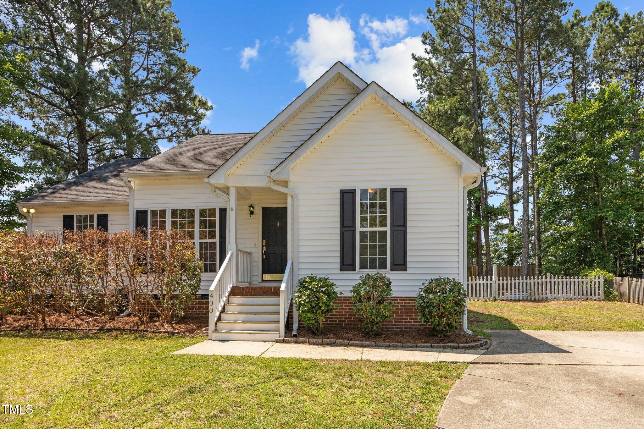 408 Flagg Road Holly Springs, NC 27540 - Photo 2 of 32 a view of a house with swimming pool and porch with furniture