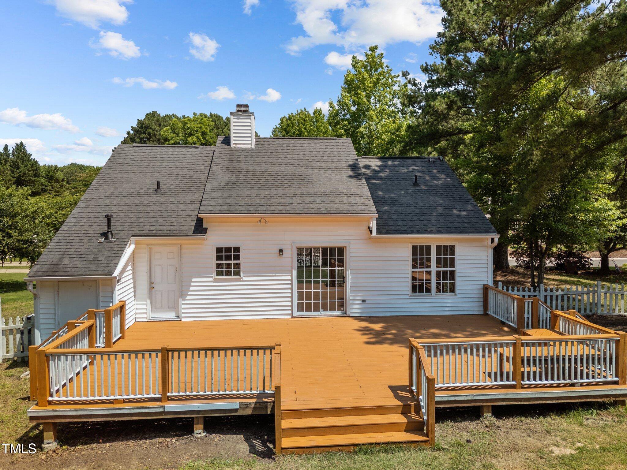 408 Flagg Road Holly Springs, NC 27540 - Photo 28 of 32 front view of a house with a yard