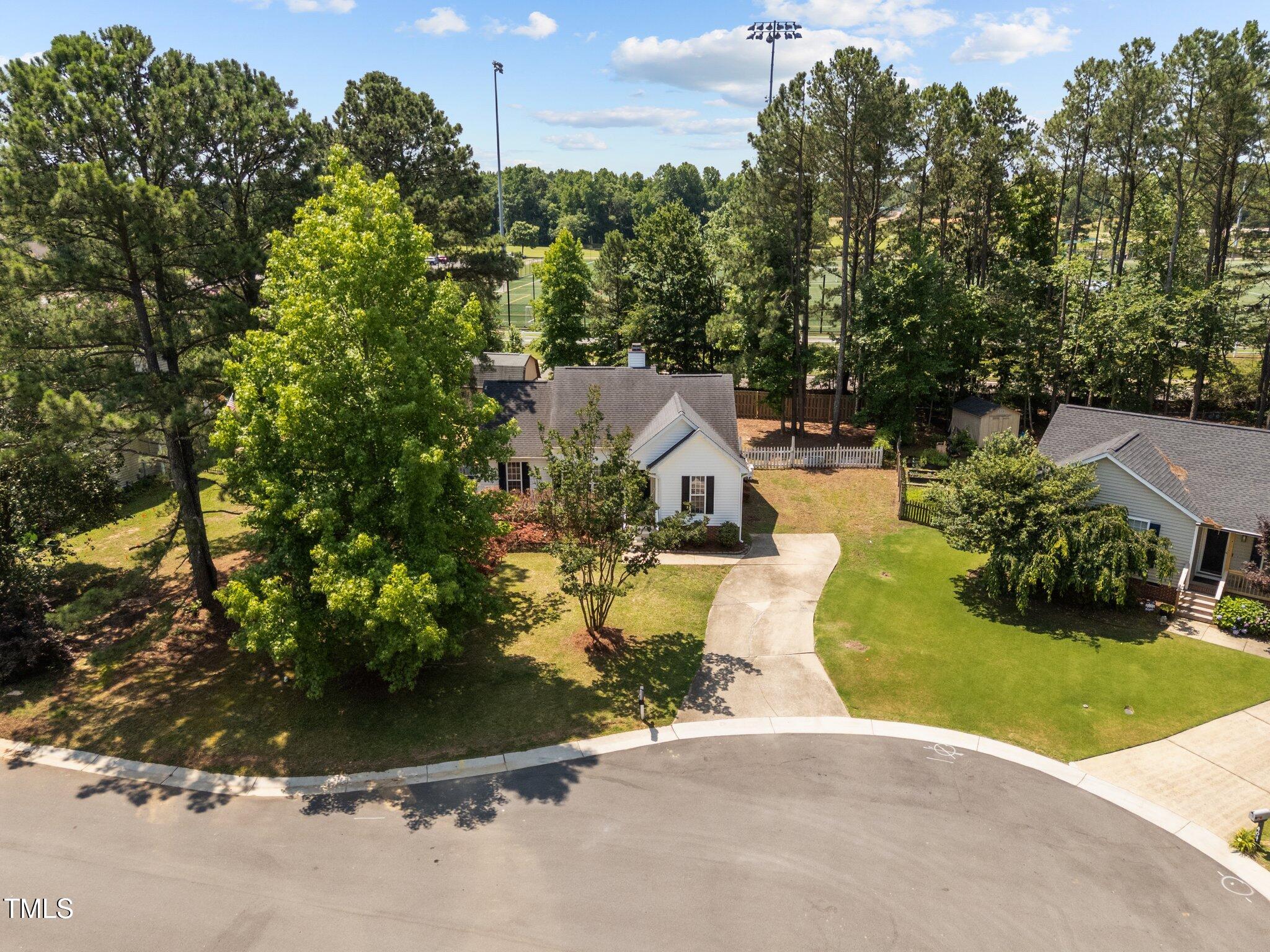 408 Flagg Road Holly Springs, NC 27540 - Photo 30 of 32 an aerial view of a house with yard swimming pool and outdoor seating