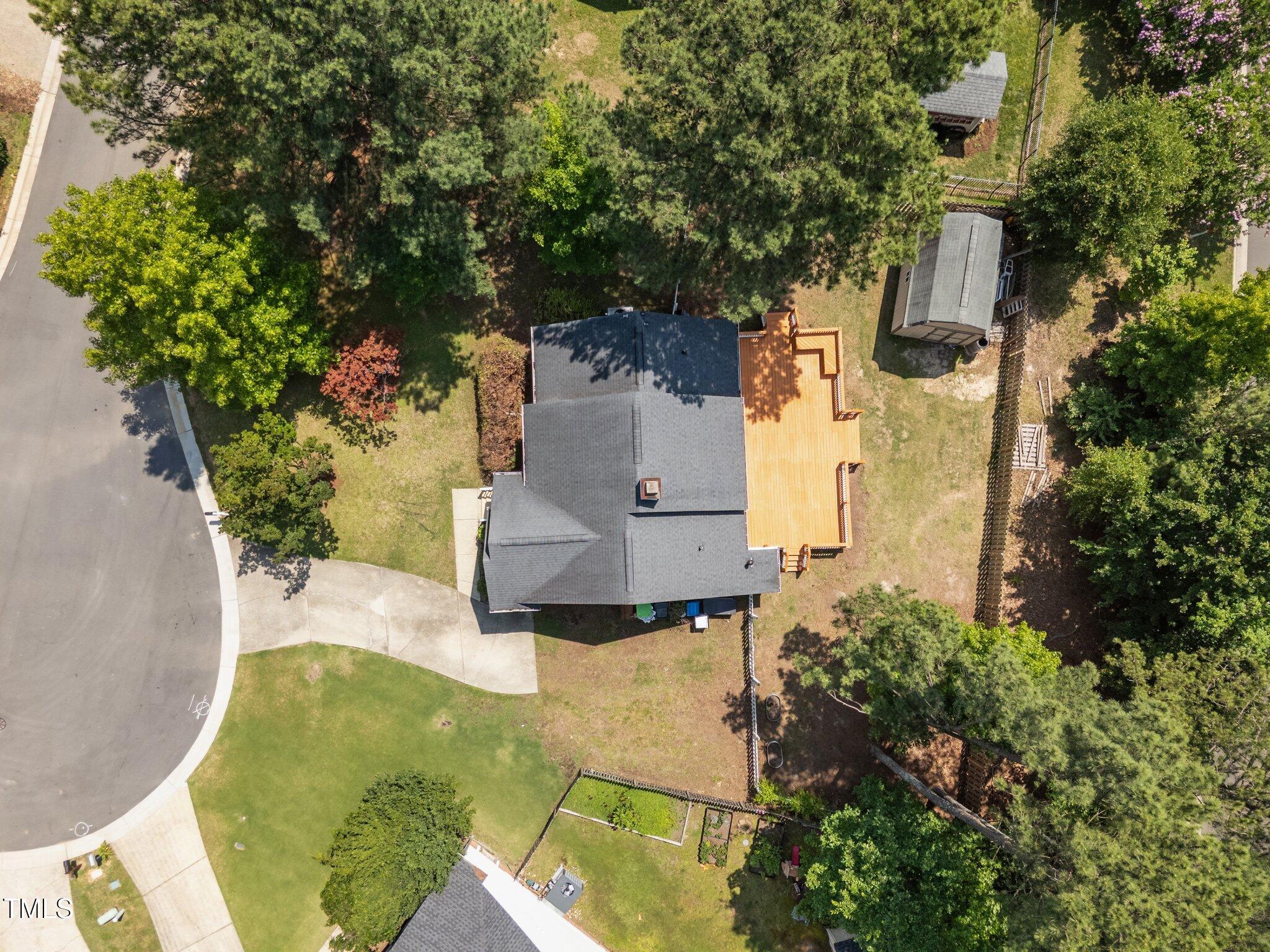 408 Flagg Road Holly Springs, NC 27540 - Photo 32 of 32 an aerial view of a house with a yard