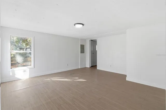 an empty room with windows