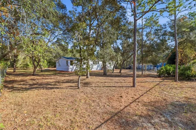 a house with trees in front of it