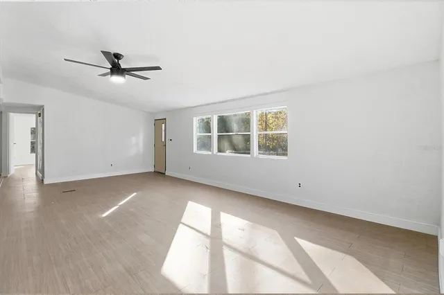 an empty room with windows