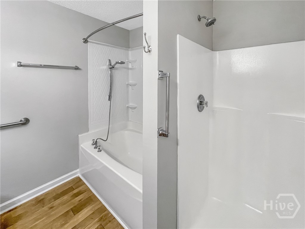 251 Autumn Ridge Court Gray, GA 31032 - Photo 22 of 31 Primary Bathroom garden tub and separate shower