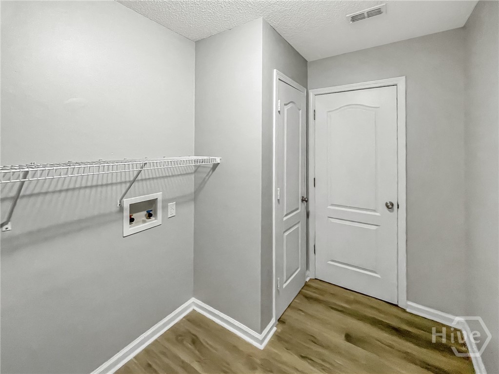 251 Autumn Ridge Court Gray, GA 31032 - Photo 30 of 31 Laundry room/storage closet