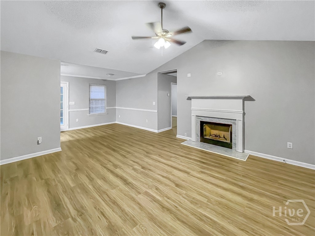 251 Autumn Ridge Court Gray, GA 31032 - Photo 10 of 31 Family Room with Fireplace/ Dining area view