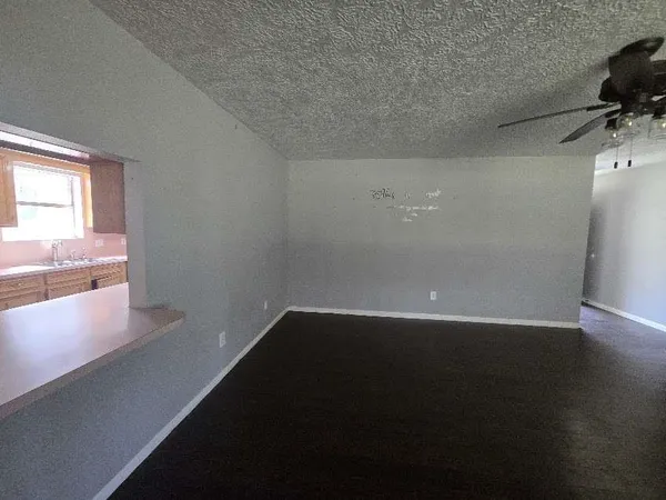 a view of an empty room and window