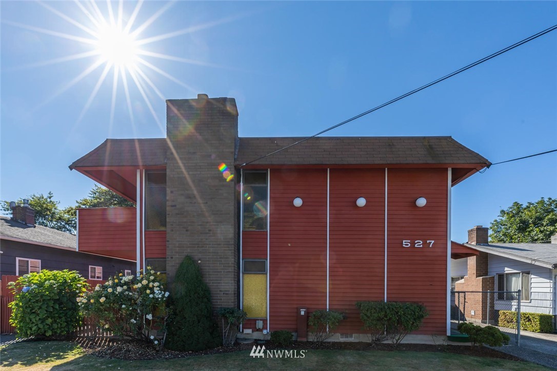 527 Williams Avenue North Renton, WA 98057 - Photo 1 of 13 a front view of a house with garden