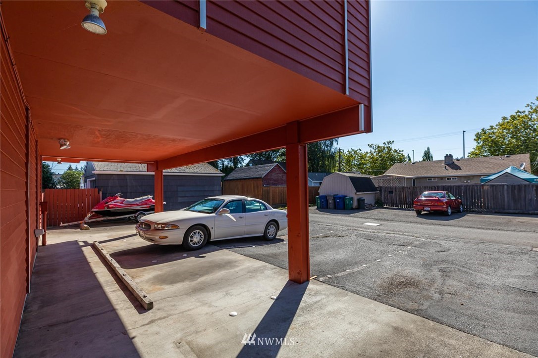 527 Williams Avenue North Renton, WA 98057 - Photo 5 of 13 a car parked in front of a house