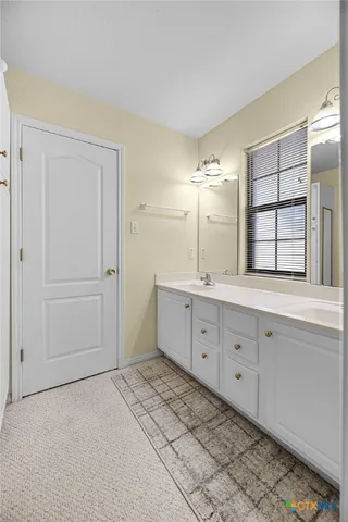 a room with furniture and a chandelier