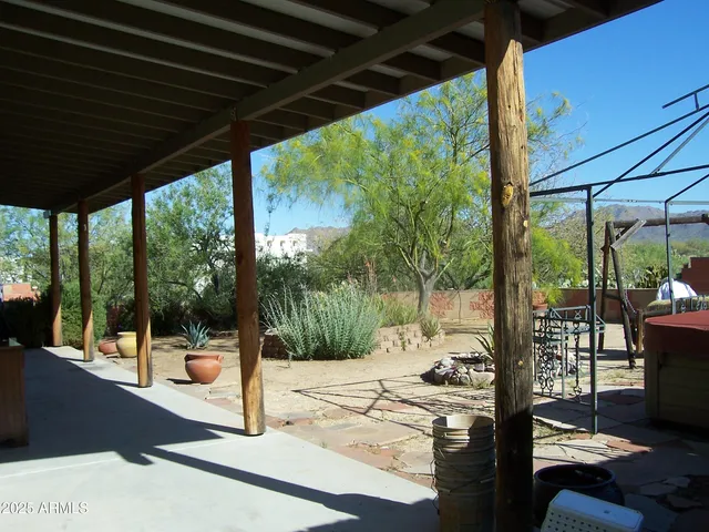 a outdoor view of a mountain from a balcony