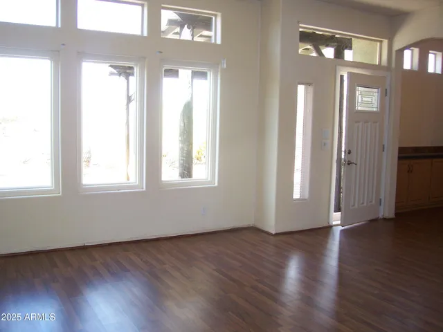 a view of livingroom with hardwood floor and window