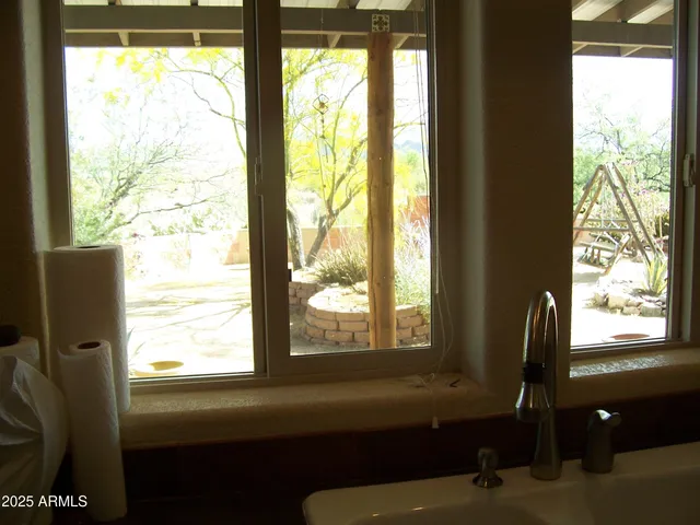 a view of a window and dining room