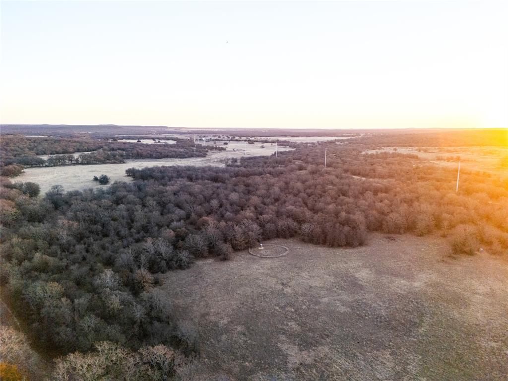 an aerial view of residential house and green space