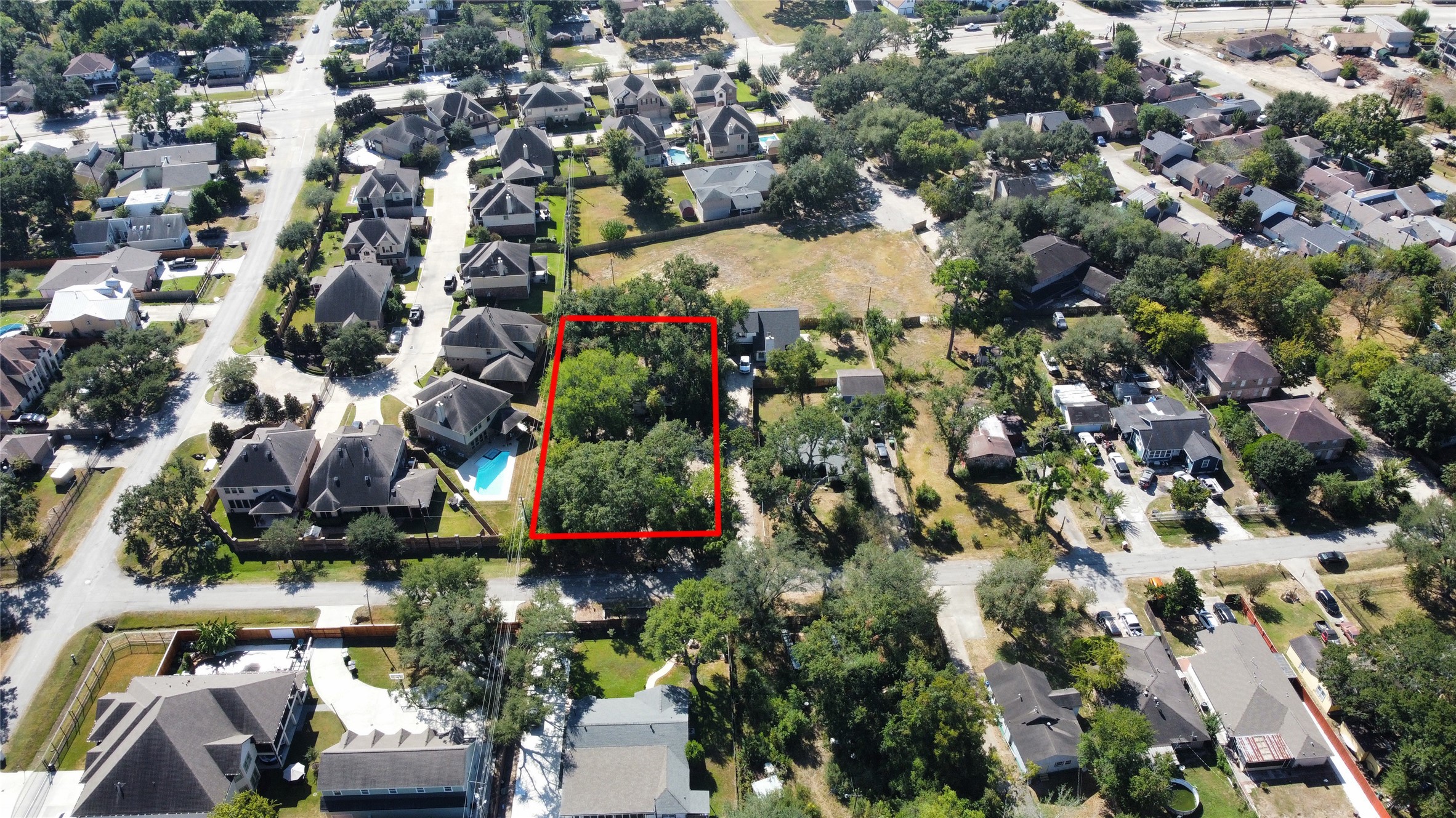 9209 Kerrwood Lane Houston, TX 77080 - Photo 4 of 11 an aerial view of residential houses with outdoor space