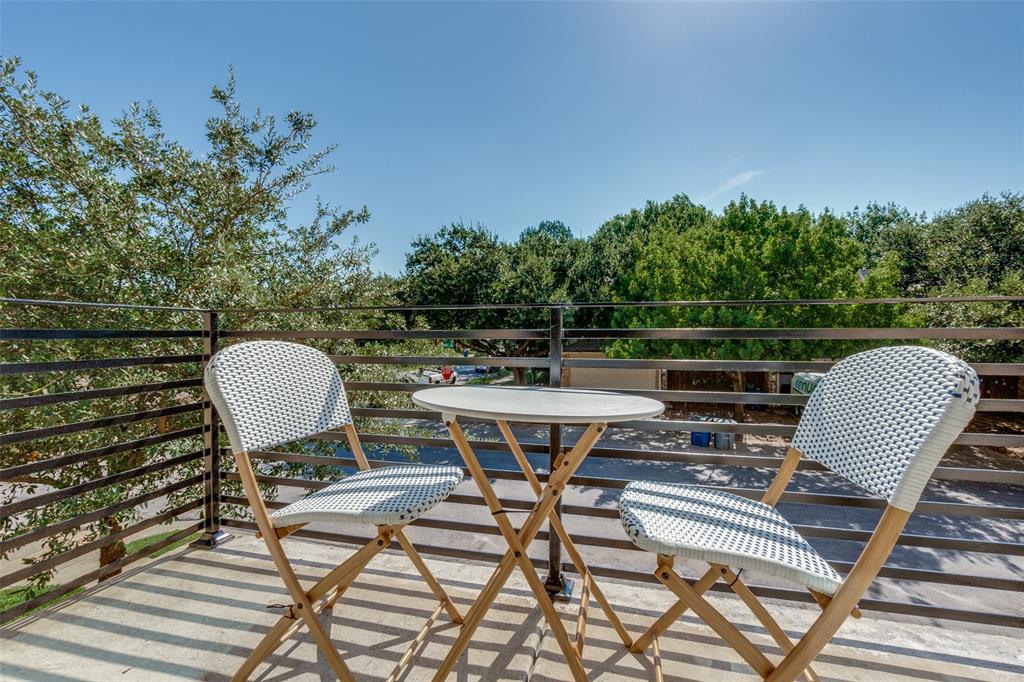 5830 Oram Street, Unit 5 Dallas, TX 75206 - Photo 4 of 18 a view of a chairs and table in patio