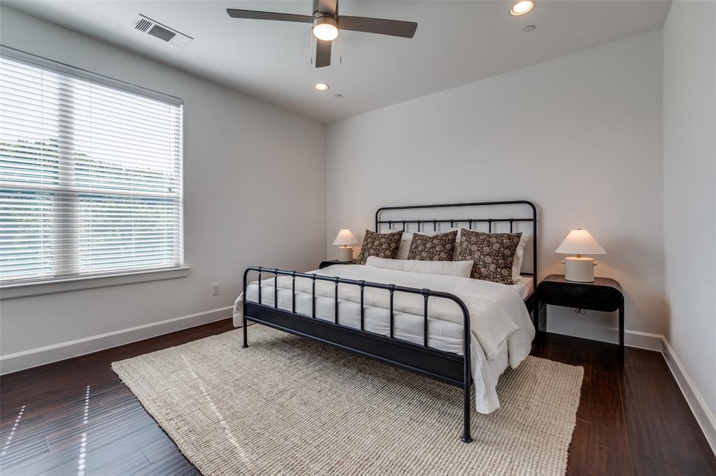 5830 Oram Street, Unit 5 Dallas, TX 75206 - Photo 15 of 18 a bedroom with a bed and a window