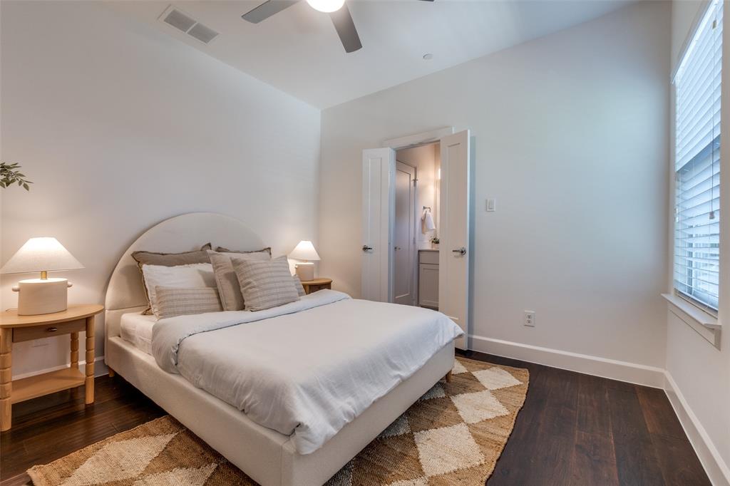 5830 Oram Street, Unit 5 Dallas, TX 75206 - Photo 16 of 18 a bedroom with a bed and a window