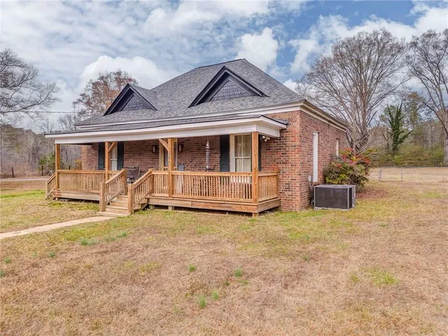 a view of balcony with furniture