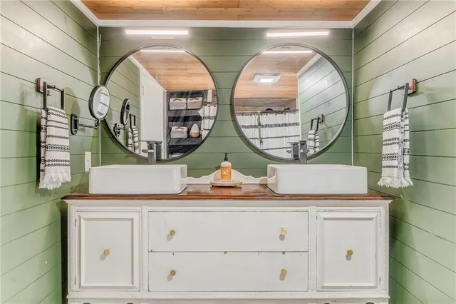 a bedroom with furniture and a wooden floor