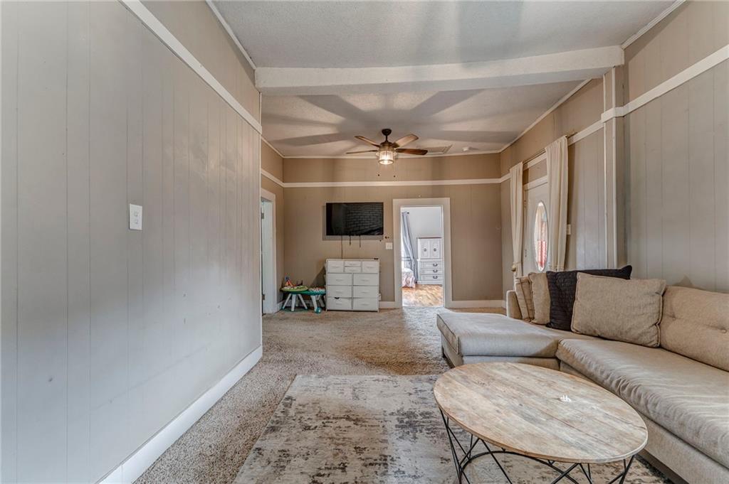 455 River Bend Road Southwest Plainville, GA 30733 - Photo 39 of 59 a living room with furniture and a couch