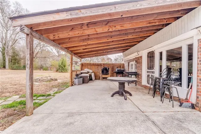 a view of a house with snow on the wall