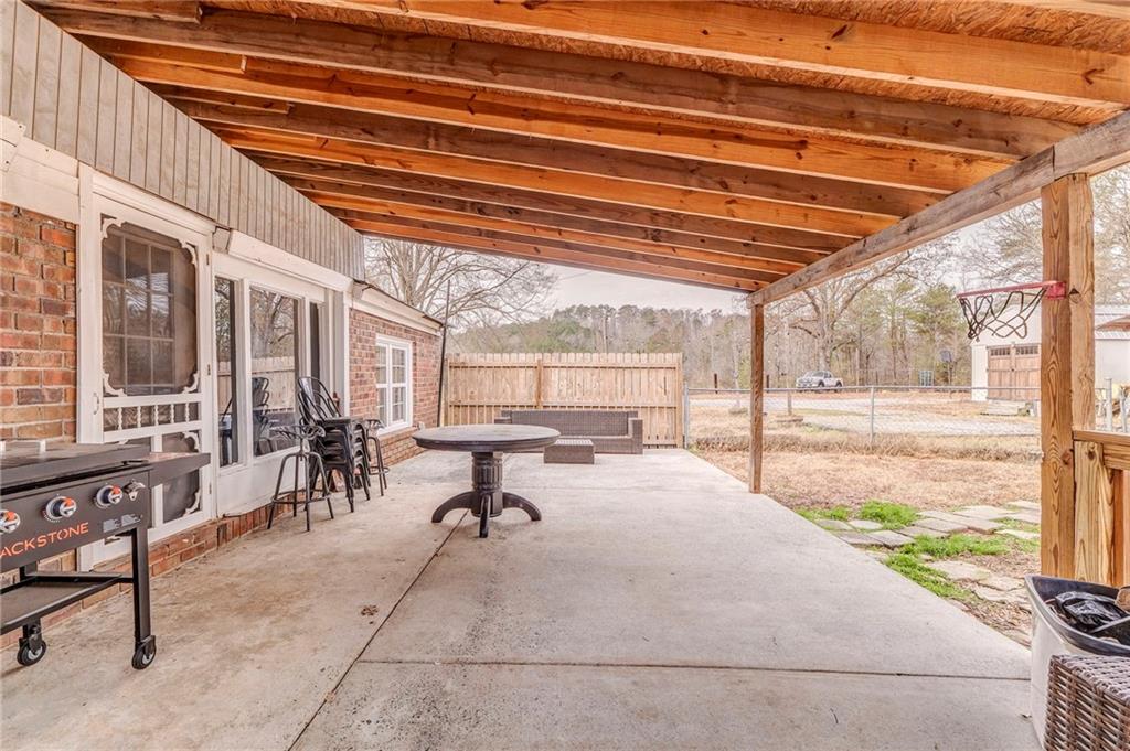 455 River Bend Road Southwest Plainville, GA 30733 - Photo 41 of 59 a view of a swimming pool with outdoor seating