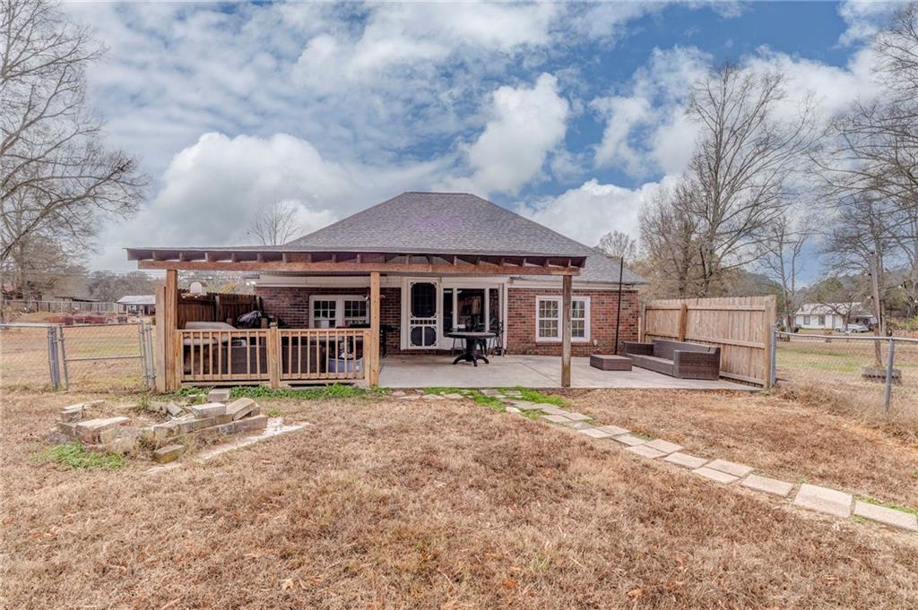 455 River Bend Road Southwest Plainville, GA 30733 - Photo 42 of 59 a view of a house with swimming pool and sitting area