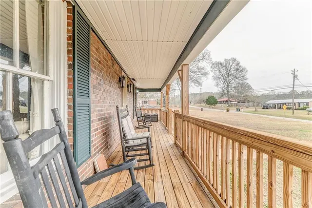a kitchen with a refrigerator and a sink