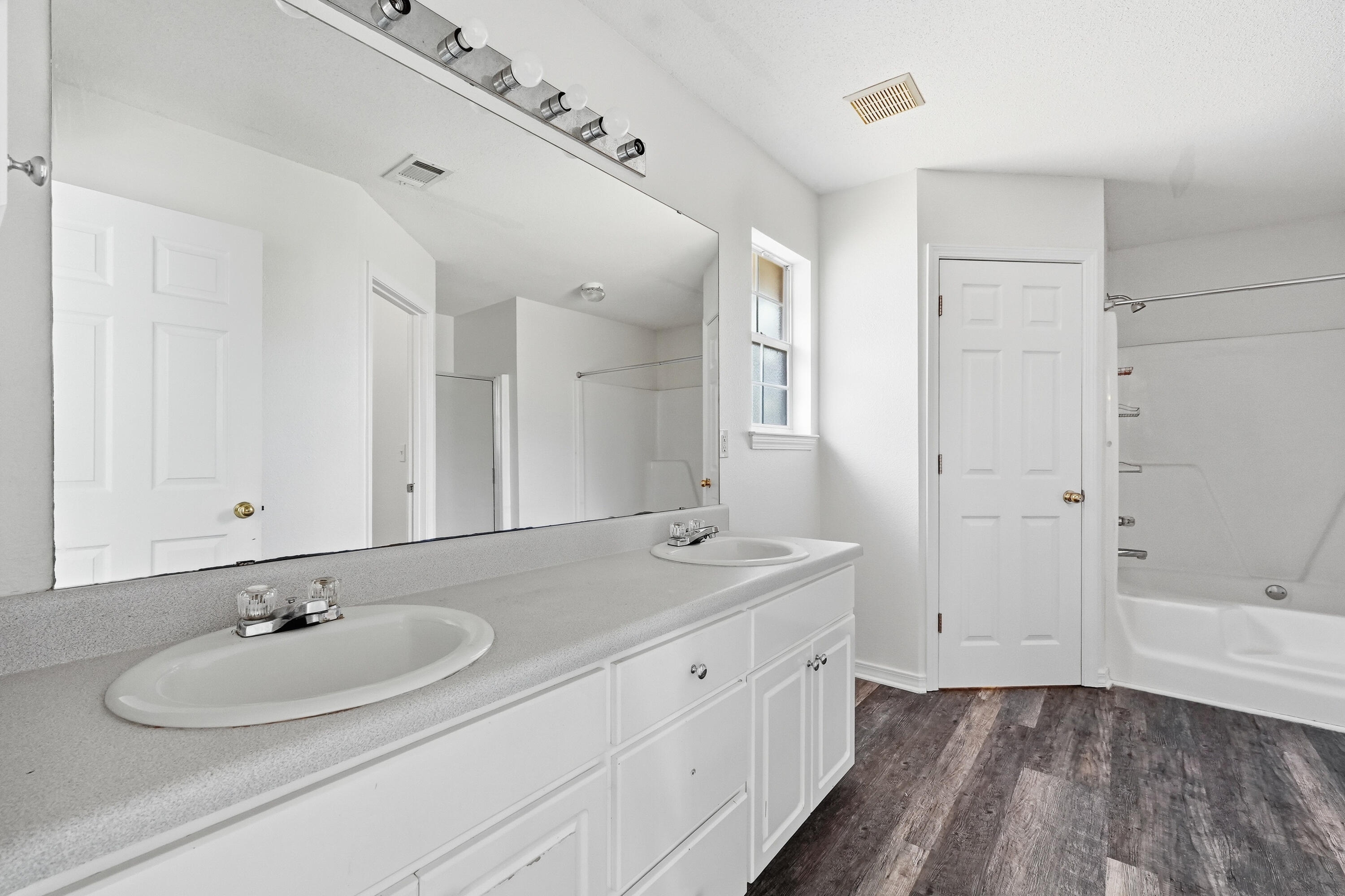 4087 Audiss Road Milton, FL 32583 - Photo 24 of 34 a bathroom with a sink and a mirror