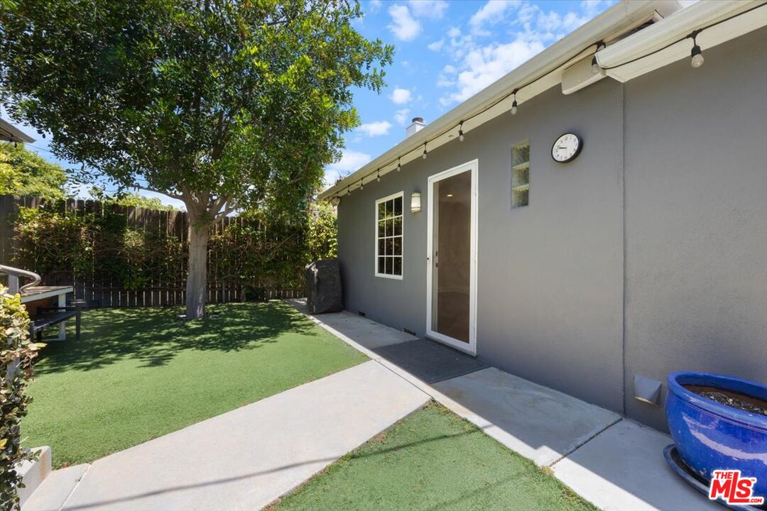 14041 Roblar Road Sherman Oaks, CA 91423 - Photo 37 of 47 a front view of a house with a yard