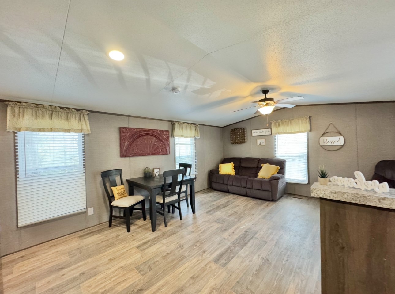 1575 County Rd B Lexington, TX 78947 - Photo 12 of 35 a living room with furniture and wooden floor