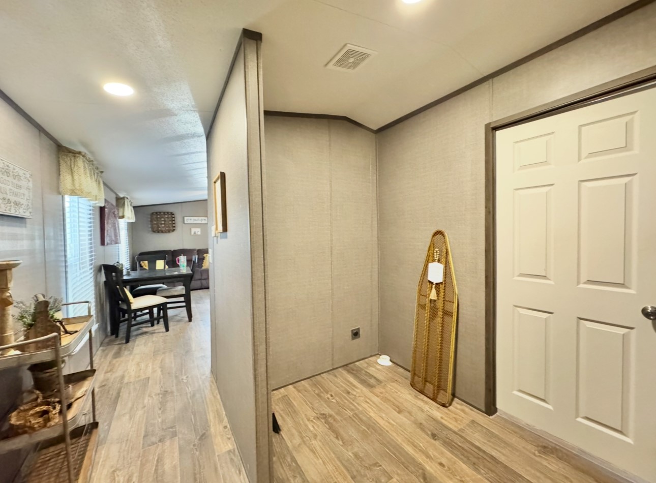 1575 County Rd B Lexington, TX 78947 - Photo 17 of 35 a view of kitchen with furniture and wooden floor
