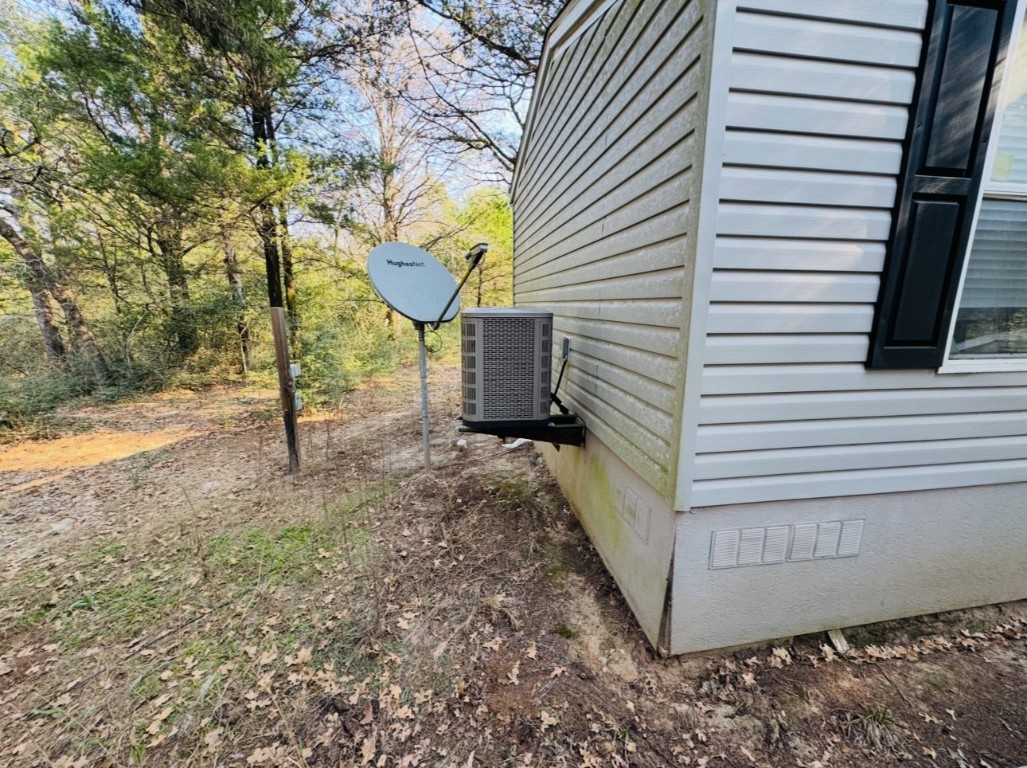 1575 County Rd B Lexington, TX 78947 - Photo 26 of 35 a view of a house with a yard