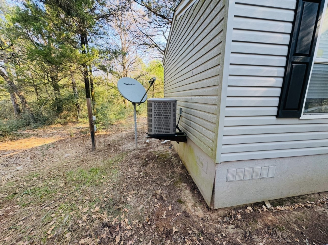 1575 County Rd B Lexington, TX 78947 - Photo 26 of 35 a view of a house with a yard