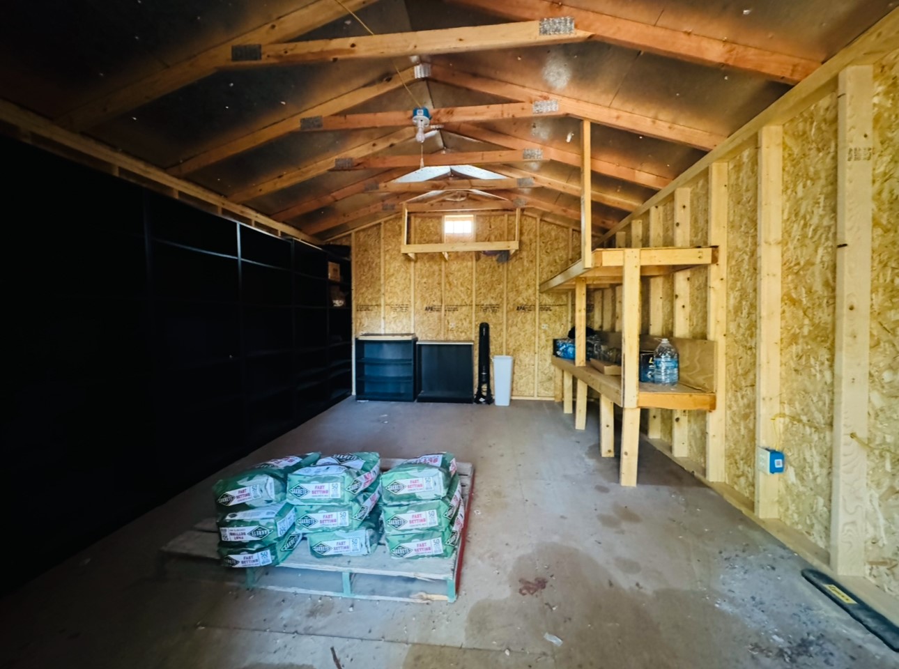1575 County Rd B Lexington, TX 78947 - Photo 31 of 35 a view of a porch with furniture and a fireplace