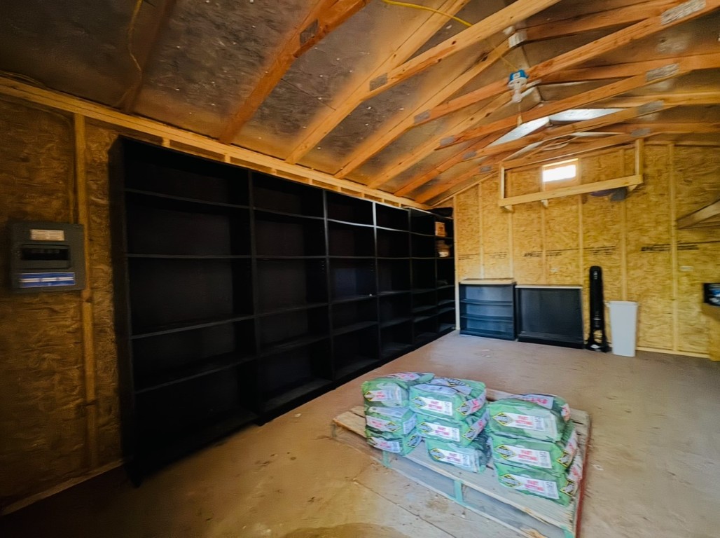 1575 County Rd B Lexington, TX 78947 - Photo 32 of 35 a view of an empty room with wooden floor