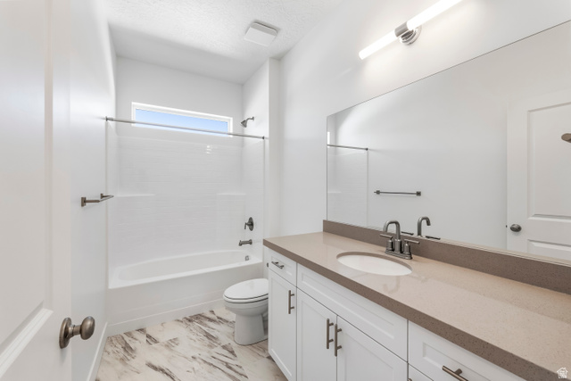58 South Crimson Way, Unit 306 Mapleton, UT 84664 - Photo 16 of 24 Modern bathroom featuring a single vanity with a light gray countertop, undermount sink, and brushed nickel faucet