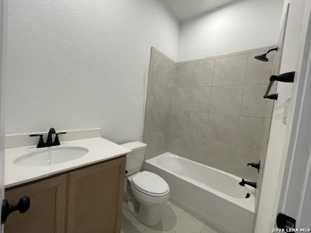 9431 Hidden Stone Schertz, TX 78154 - Photo 19 of 30 a bathroom with a sink a toilet and shower