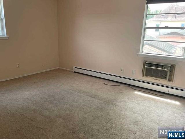 435 Teaneck Road, Unit 19 Ridgefield Park, NJ 07660 - Photo 2 of 7 a view of an empty room with a window