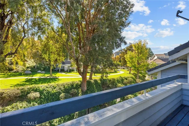 a view of swimming pool from a balcony