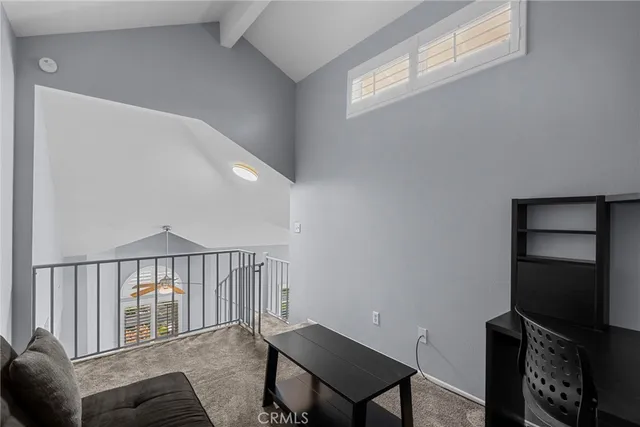 a view of a livingroom with furniture